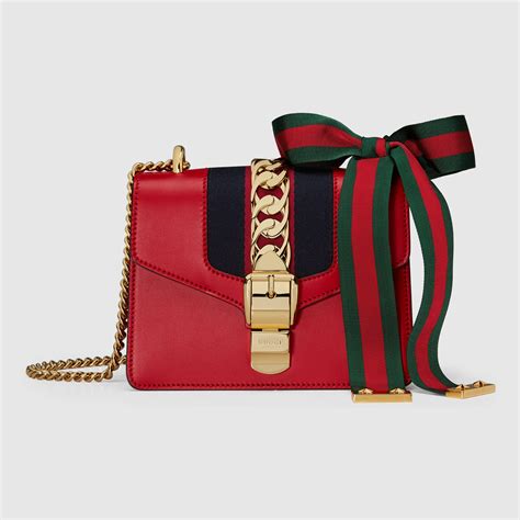 gucci sylvie leather mini chain bag replica|gucci bag red and blue.